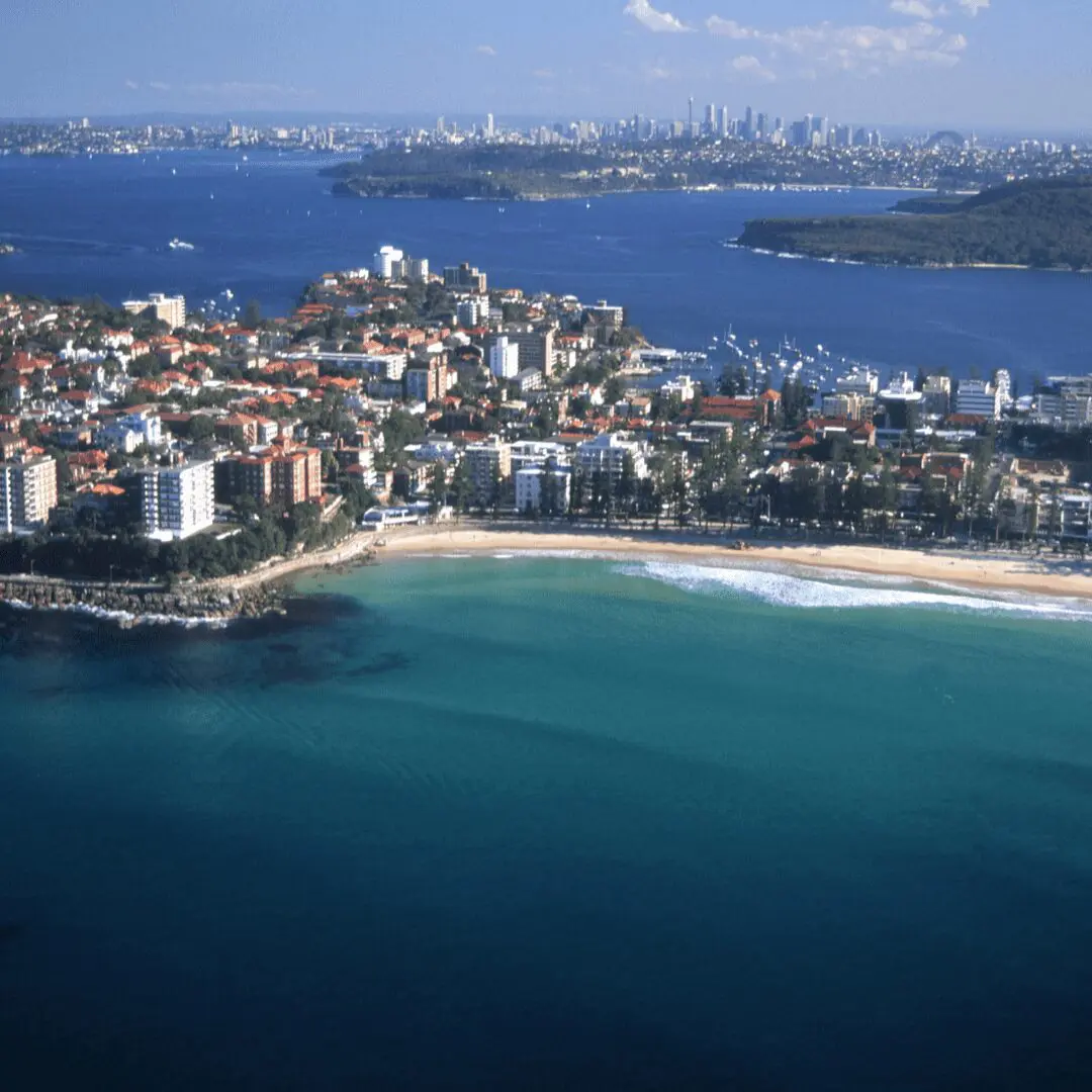 3 Eastern aerial of Manly showing surf, homes, and beaches – key view for any Manly buyers agent.