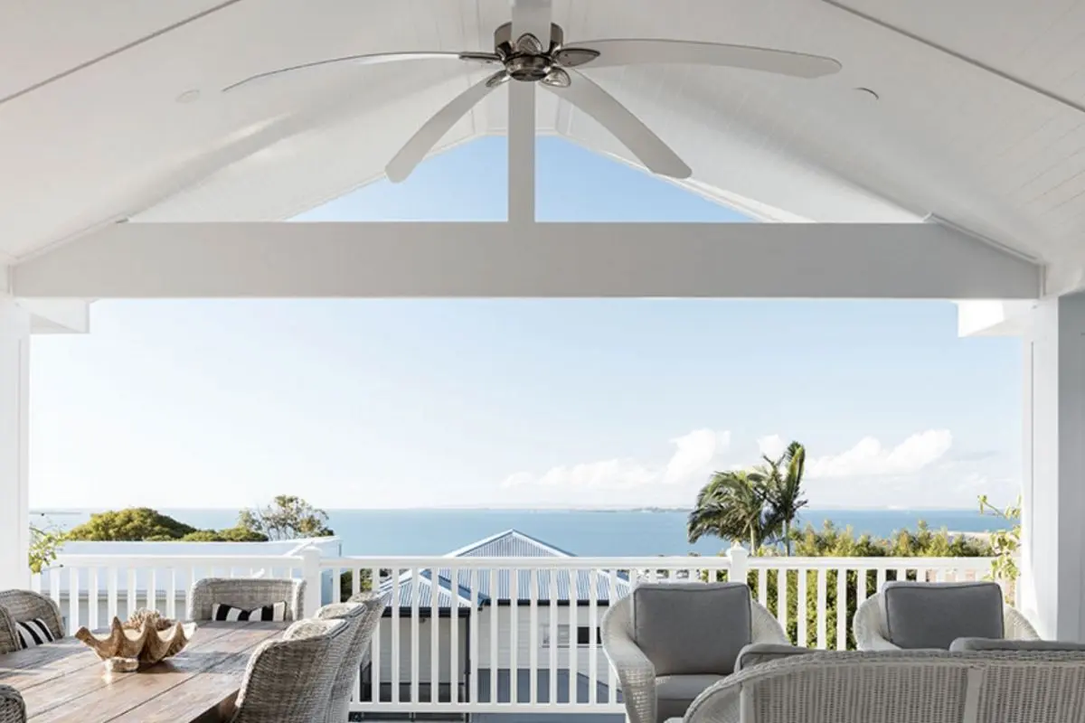 68-coastal-balcony-living-northern-beaches-buyers-agent Covered balcony overlooking treetops, coastal home ideal for Northern Beaches buyers agent search.