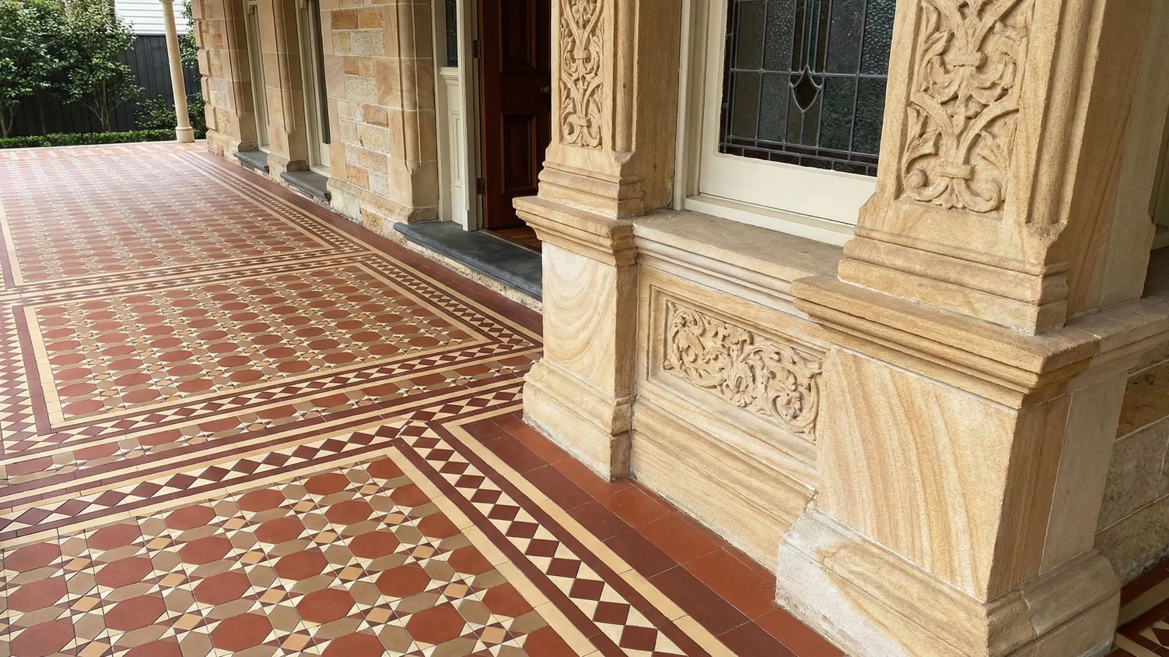 Close up of heritage sandstone verandah and tessellated tiles on a Federation home in Pymble, typical of properties secured by Upper North Shore Buyers Agents