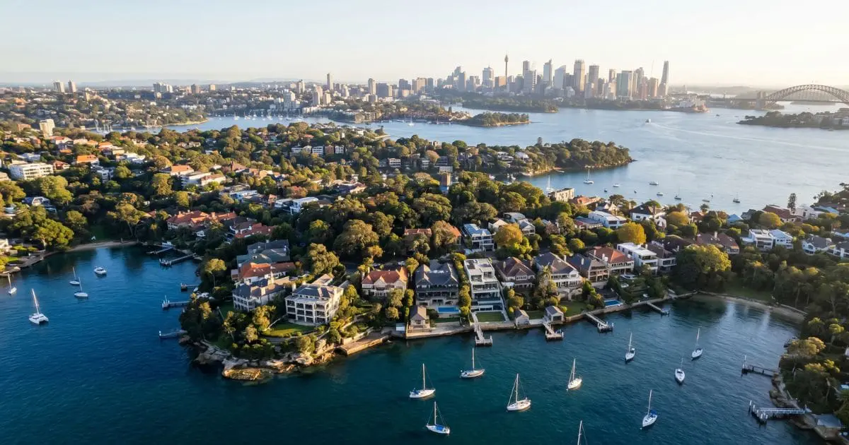 Aerial view of Mosman and Sydney's Lower North Shore, showing the harbourside bays, leafy headlands and substantial family homes that define the region