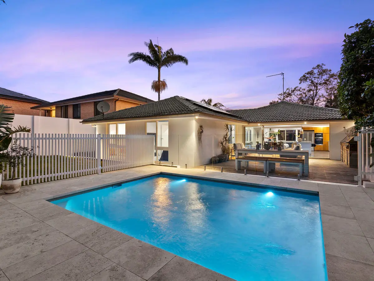 Pool and outdoor living at dusk at a family home on Lincoln Avenue, Collaroy