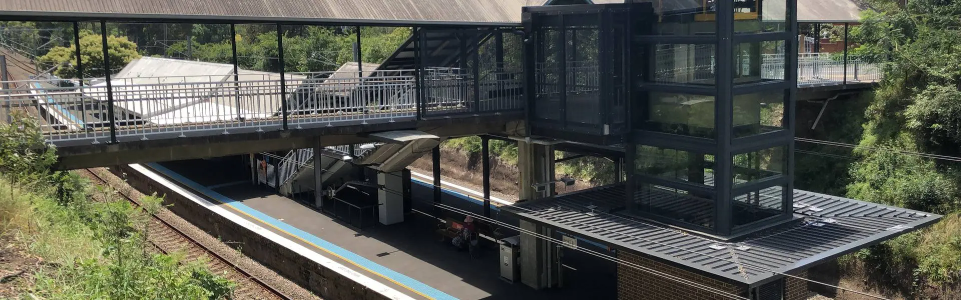 Warrawee railway station among the trees, looking north towards Wahroonga