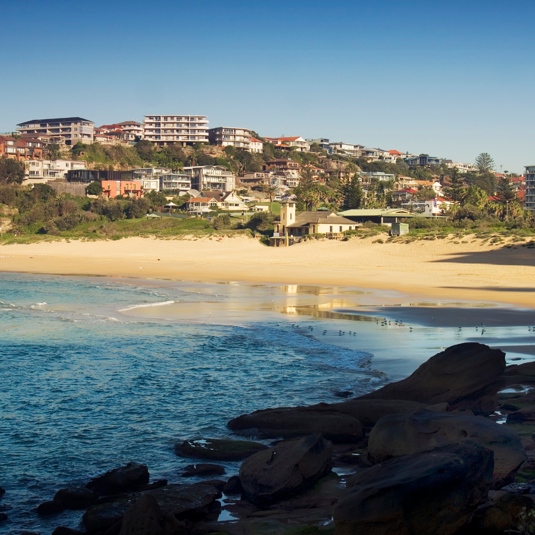 8 Aerial sunset view of Freshwater homes and headland – premium location in the Freshwater property market
