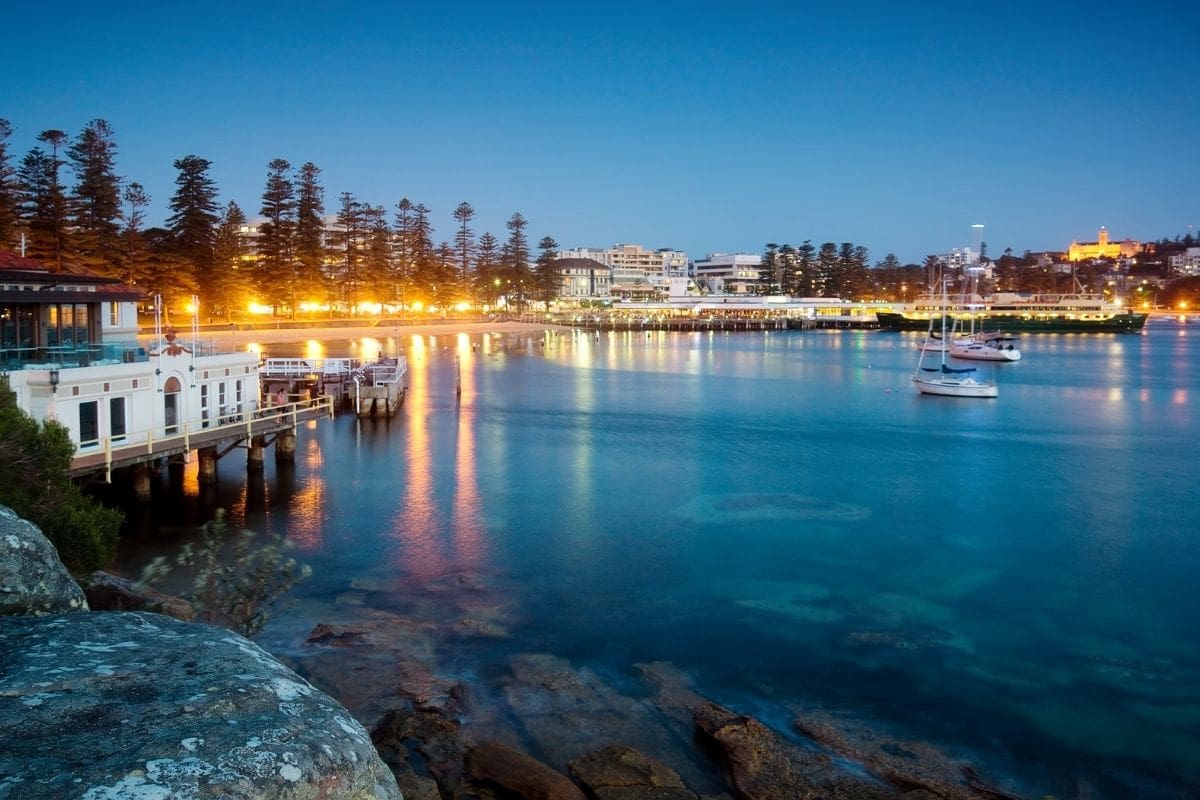 Waterfront sunset scene a tranquil lifestyle offered to Northern Beaches property buyers.