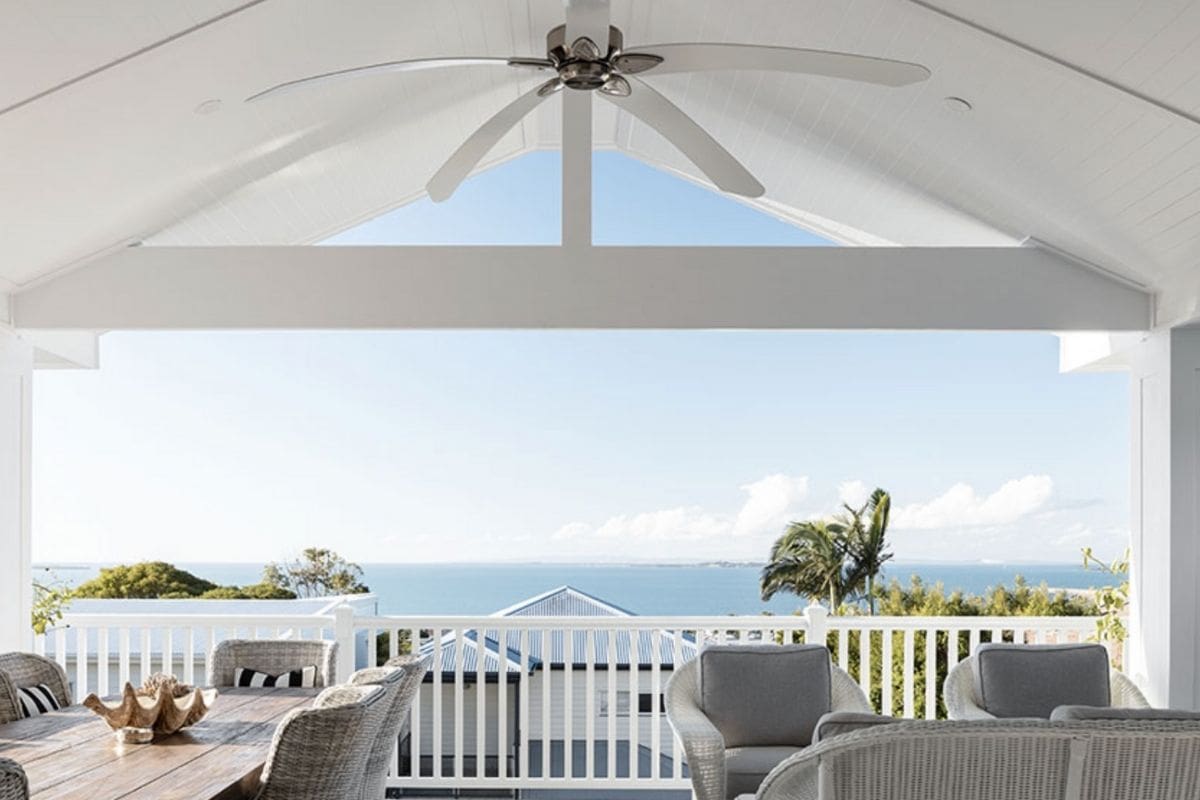 Covered balcony overlooking treetops, coastal home ideal for Northern Beaches buyers agent search.