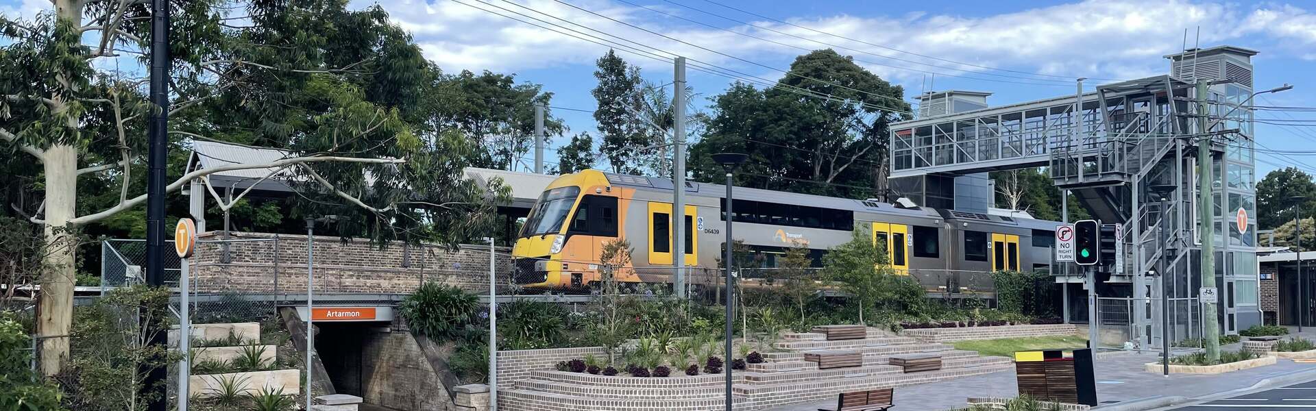 A Sydney Trains service at Artarmon station, seen from Hampden Road